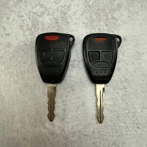 Chrysler Jeep Dodge 4-Button Key Fob OHT692713AA 05026112AB Untested Parts 2pc